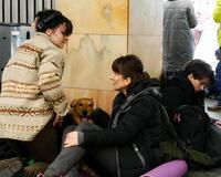 Refugees and their dog. Ukraine 2022