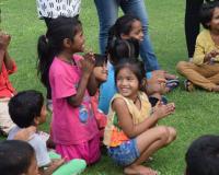 Children from Sanjay Gandhi Camp enjoying the presentations by the REC graduates. Photo: Bhavya Taneja