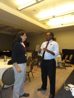 Dr Susan Koenig (Jamaica) and Mr. Robert Griffith (Trinidad) hold discussions at end of day 1