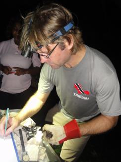 Dr. Luke Rostant (Trinibats) demonstrates how to take biometric measurements from a bat