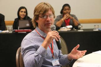 Dr. Luke Rostant (Trinidad) makes comments during group discussions