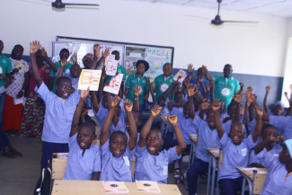 Excited kids shouting 'War against Rabies Nigeria declares a rabies free Nigeria by 2030, happy world rabies day!!!'