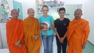Local monks bringing animals to our clinic 