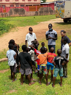 Children being taught how to recognise and avoid rabies and what they should do if bitten.