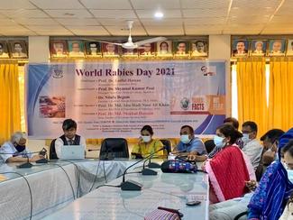 Photograph of the moderator and part of the audience of the seminar on 'Rabies Control in Bangladesh: Sharing Facts and Dispelling the Myths' that were dedicated to observing World Rabies Day at BAU.