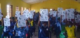 JUNIOR SECONDARY SCHOOL STUDENTS WITH THE RABIES AWARENESS POSTERS AT THE WORLD RABIES DAY 2021 SYMPOSIUM