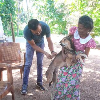 Vaccinating a dog owned by underprivileged people