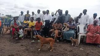 Dog owners waiting for vaccination of their dogs