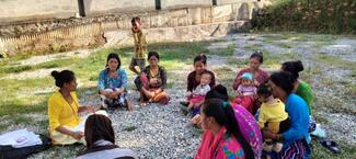 Group of women sitting around