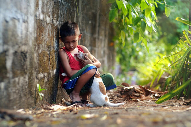 Boy hugging dog. #LovingDogsIsGlobal