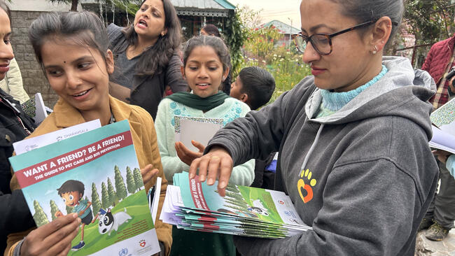 DAR handing out GARC Want A Friend booklets